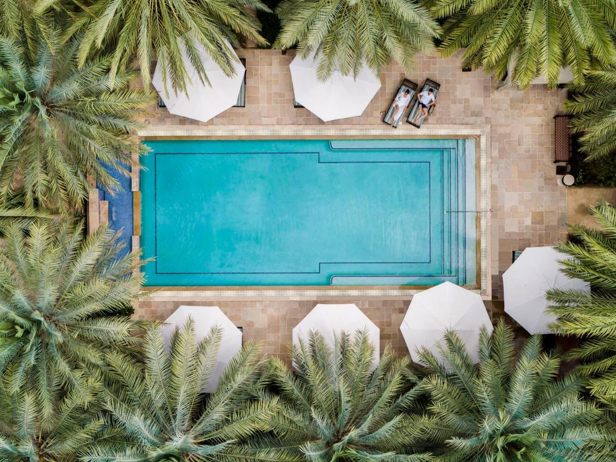 Jumeirah Dar Al Masyaf Dubai Bagian luar foto Aerial view of the pool at the Four Seasons Hotel